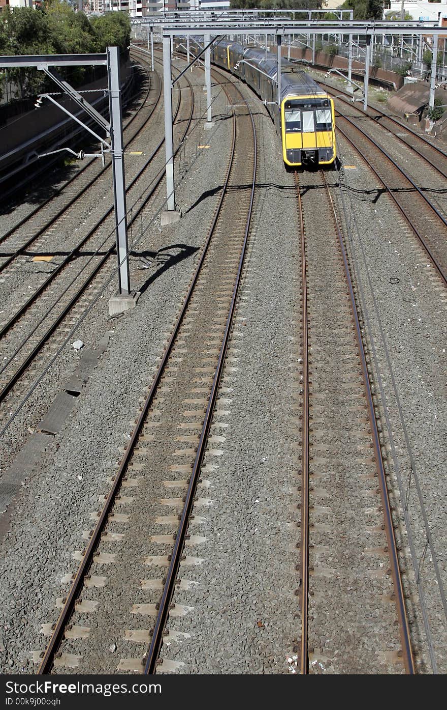 Straight Railway Tracks With Approaching Train, Public Transportation