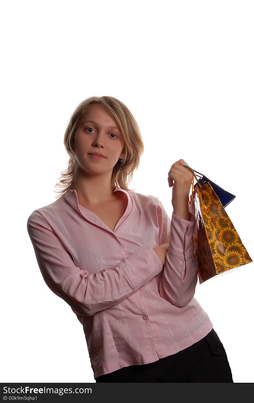 Women with shopping bags on white