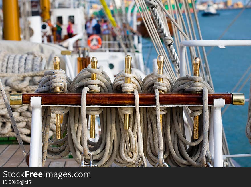 Golden pieces to tie the rope on old tall ship. Golden pieces to tie the rope on old tall ship