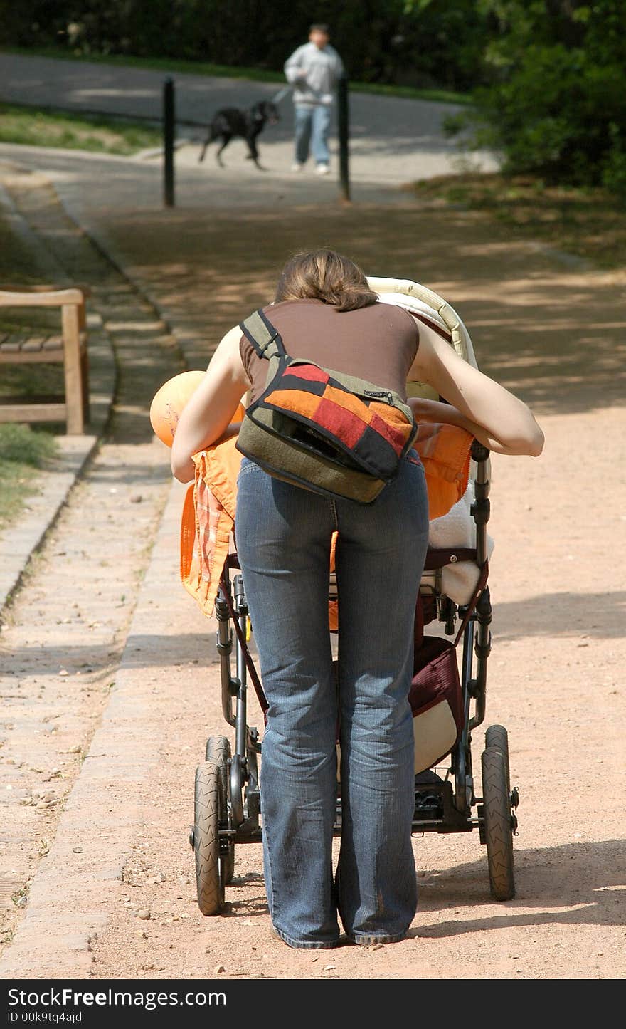 Mum pushing a pram