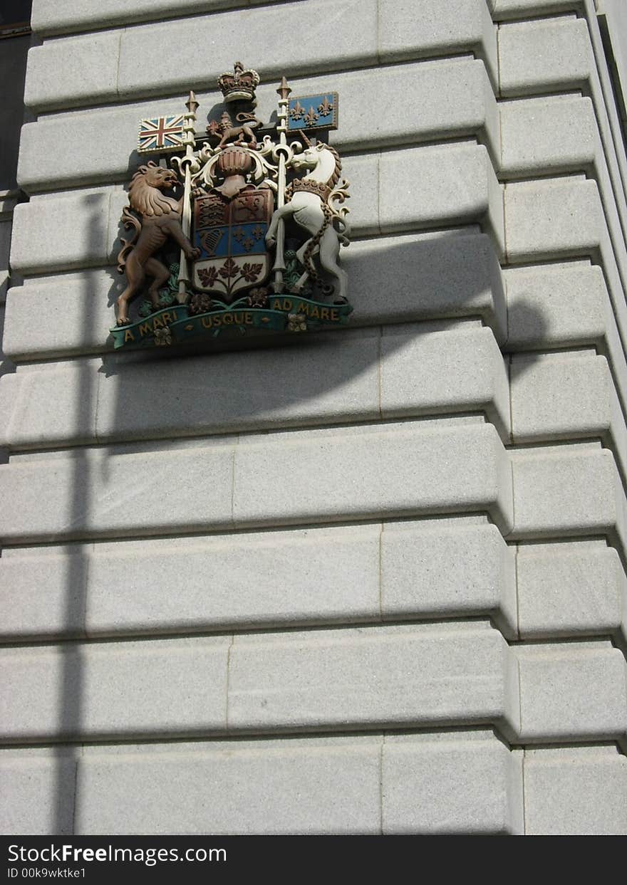 Arms And shadow of  Flag on the street of montreal