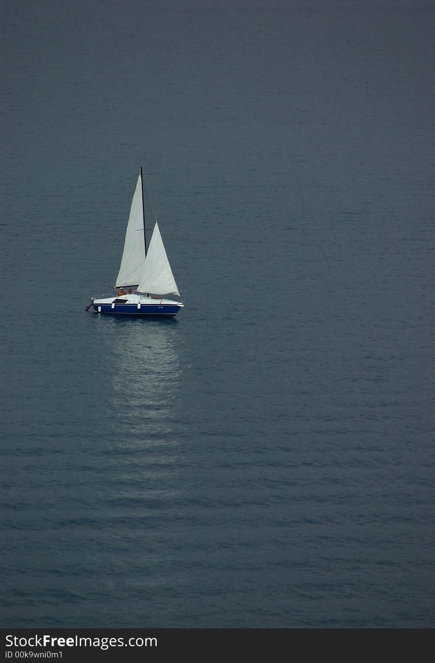 Lonely Sail Boat At The Sea Of Montenegro