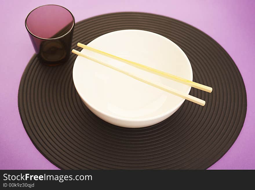 Empty rice bowl on the modern purple kitchen table