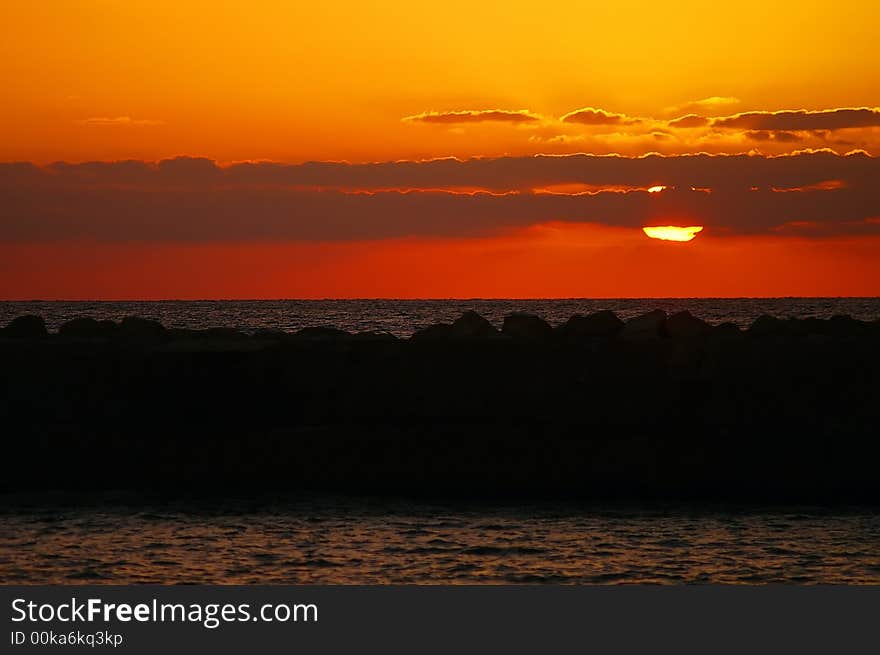 Cloudy sunset on Tel Aviv beach. Cloudy sunset on Tel Aviv beach