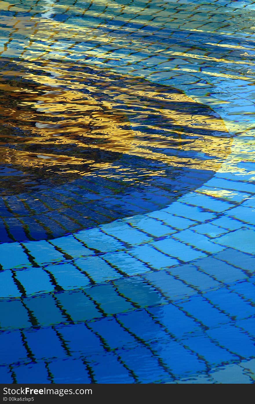 Pool with tiles in differnt shades of blue. Pool with tiles in differnt shades of blue