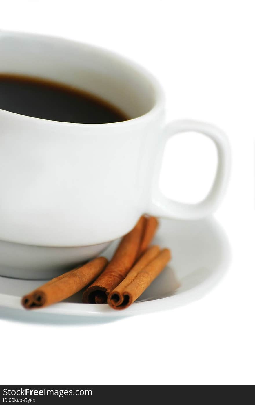 Cup of coffee with cinnamon