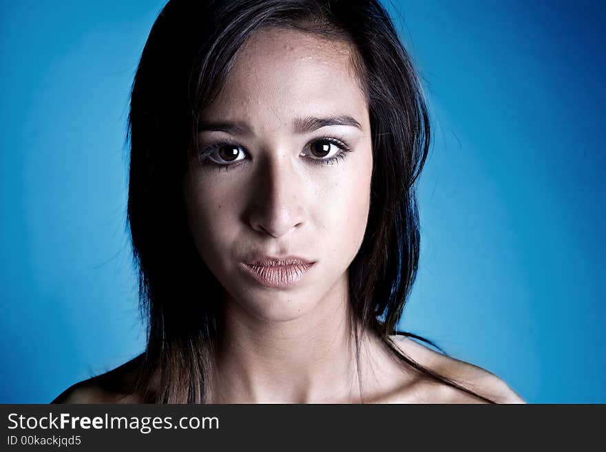 A 15 year old pretty girl in the photo studio on different backgrounds in different styles. A 15 year old pretty girl in the photo studio on different backgrounds in different styles.