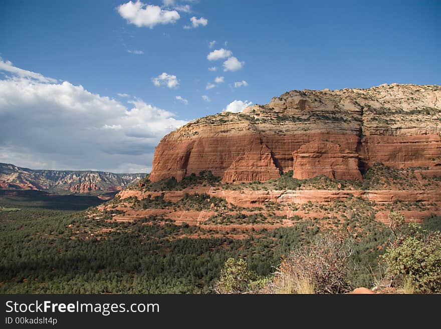 Hiking to Devil's Bridge this mesa remains a constant in the backgroun. Hiking to Devil's Bridge this mesa remains a constant in the backgroun