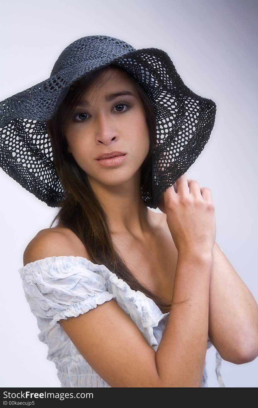 A 15 year old pretty girl in the photo studio on different backgrounds in different styles. A 15 year old pretty girl in the photo studio on different backgrounds in different styles.