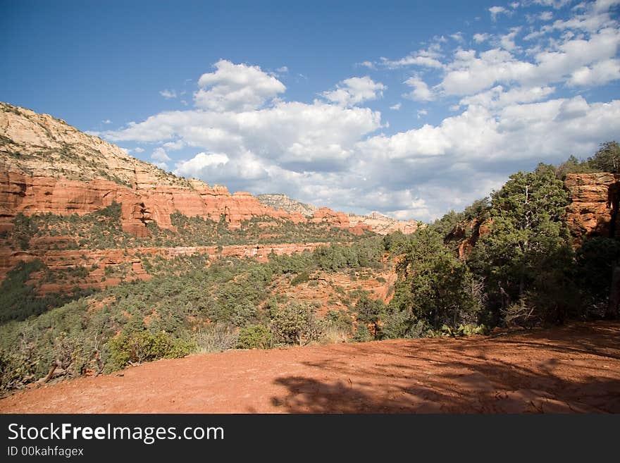 Every turn in Sedona contains yet another redrock canyon.  Shot from an overlook while ascending a mesa. Every turn in Sedona contains yet another redrock canyon.  Shot from an overlook while ascending a mesa.