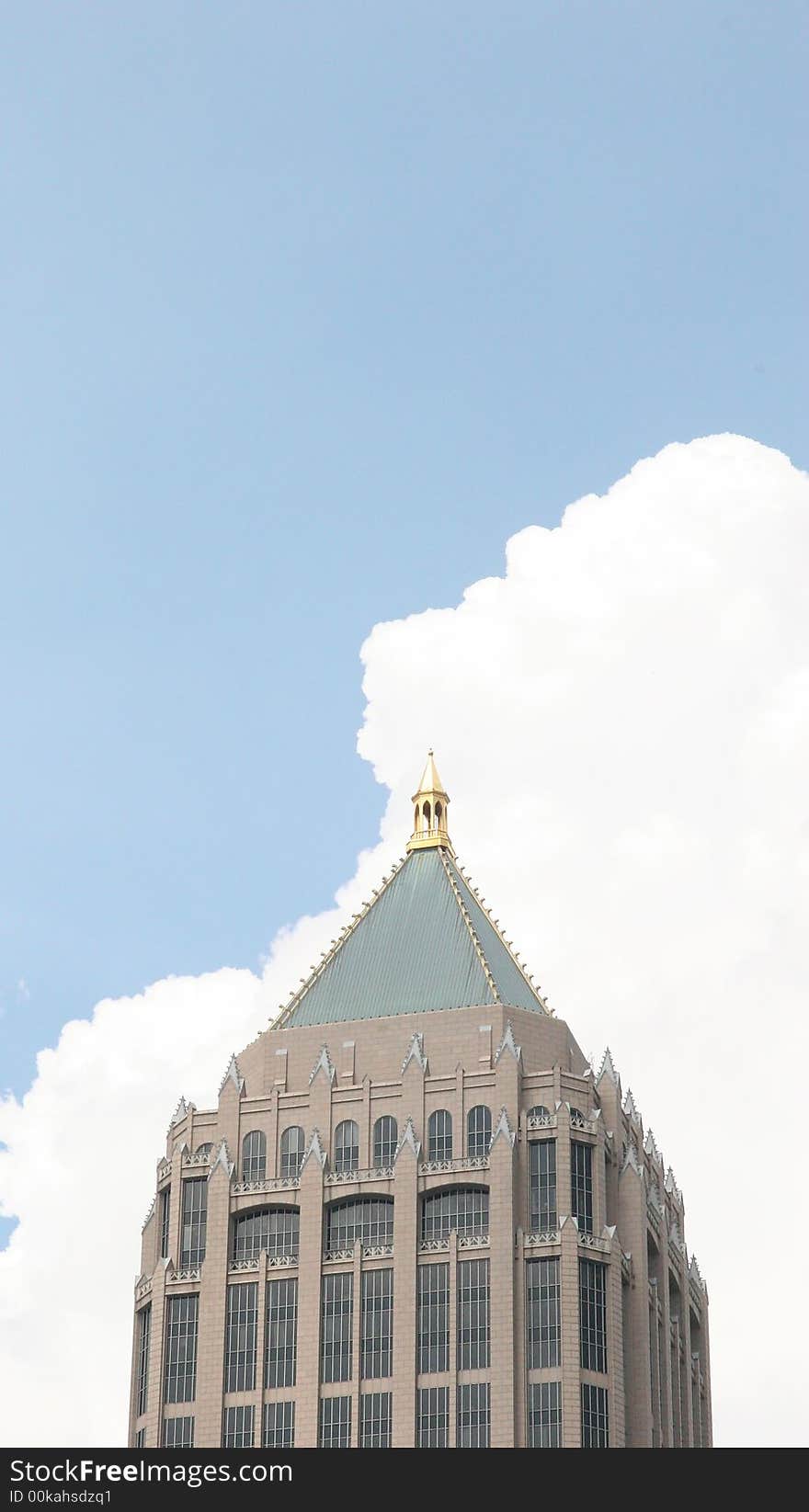 Tower Against Clouds