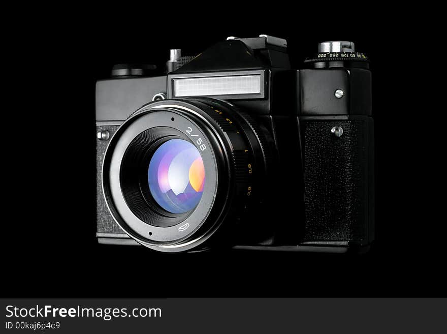 The old camera on a black background