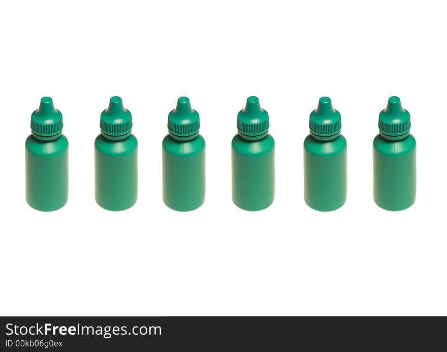 Six green phials in a row isolated on the white background