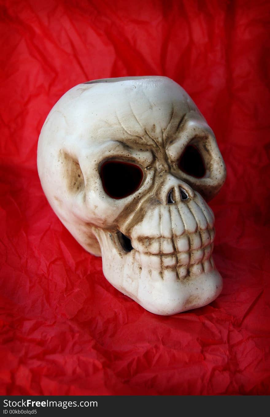 Ceramic skull with red backround. Ceramic skull with red backround