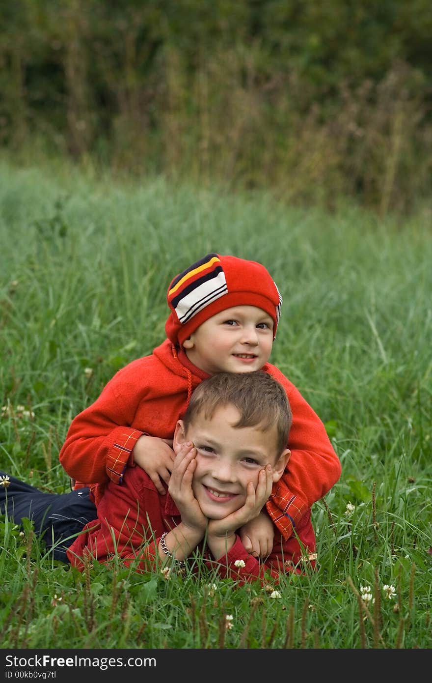 Two brothers on a grass