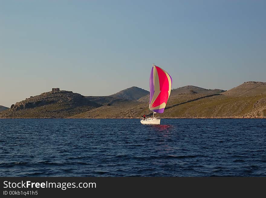 Sailing boat sailing trough National Park Kornati