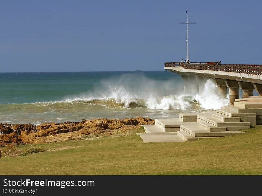 Water spray caused by strong winds and high tide. Water spray caused by strong winds and high tide