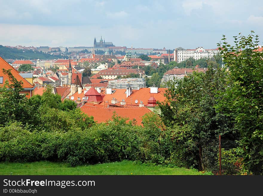 Prague red tile roofs and castle