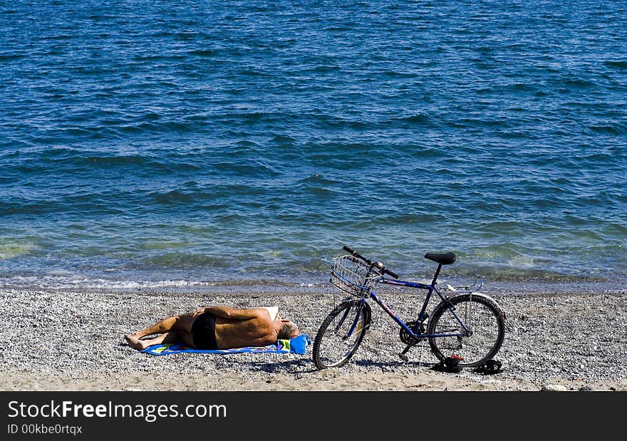 Reading On The Beach