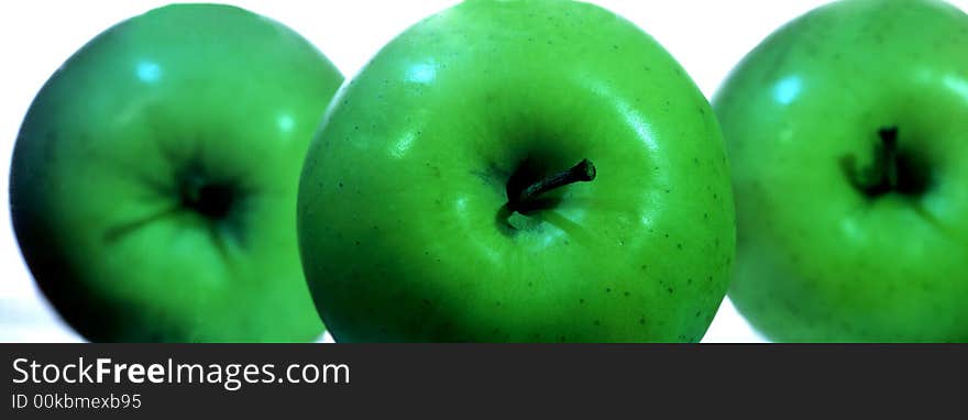 Green apple on a white background