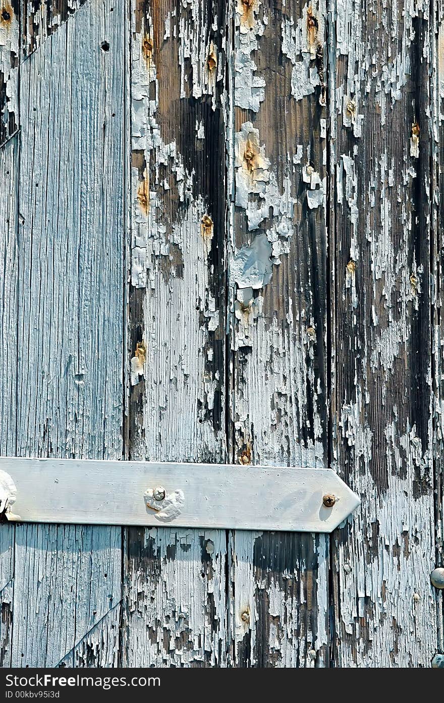 Old door with flaking paint.