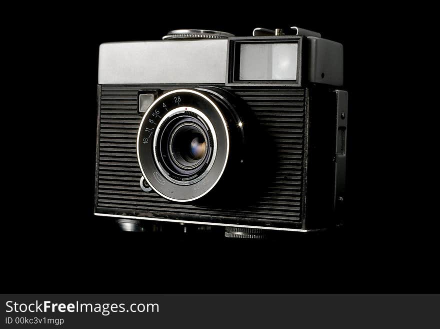 The old camera on a black background