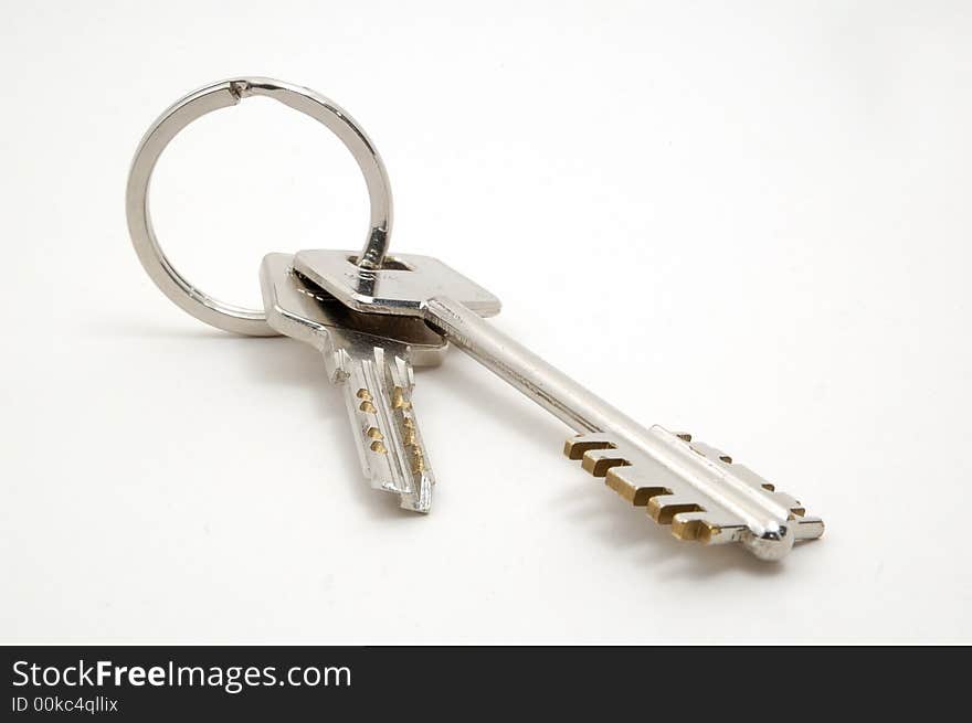 Keys of a appartment lying in white background