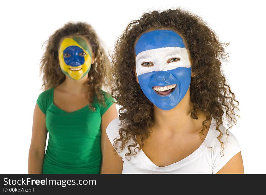 Portrait of young, Argentinian and Brazilian sport's fans with painted flags on faces. Smiling and looking at camera. Front view, white background. Portrait of young, Argentinian and Brazilian sport's fans with painted flags on faces. Smiling and looking at camera. Front view, white background