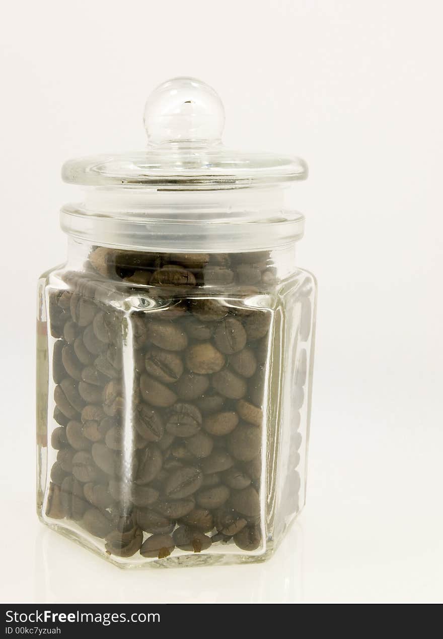 Coffee jar of beans on a white background