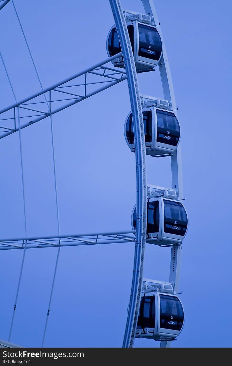 Ferris wheel on a blue background