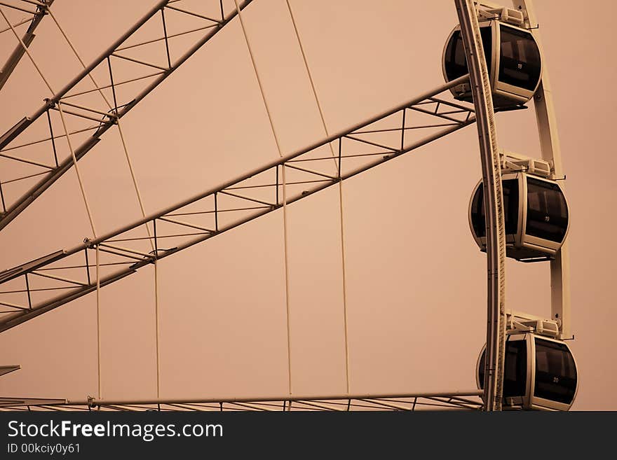 Ferris wheel on a orange background