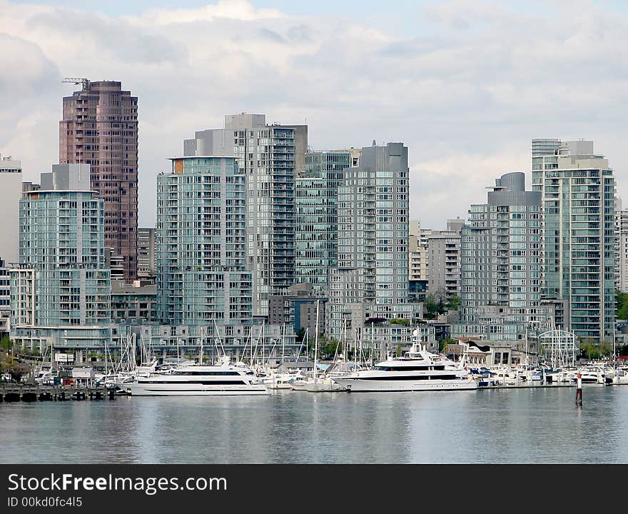 Two luxurious yachts docked in Vancouver. Two luxurious yachts docked in Vancouver