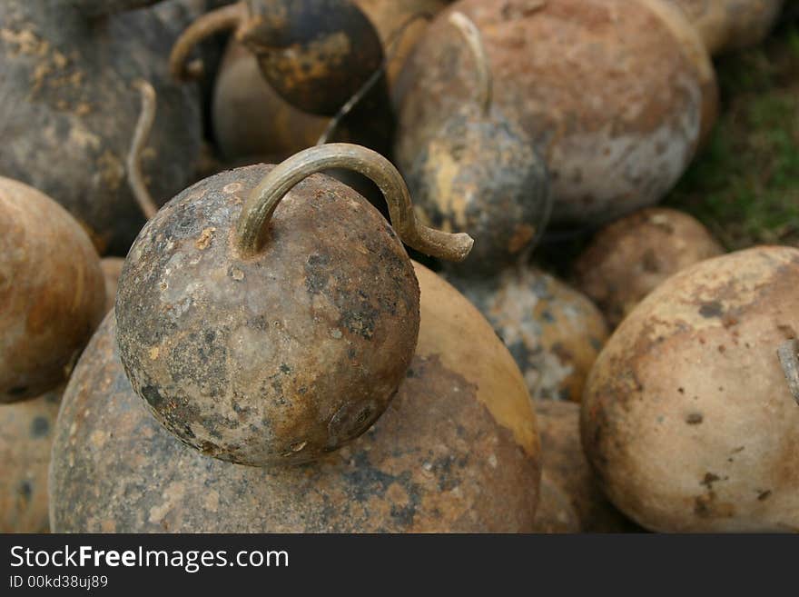 Close up of several brown gourds