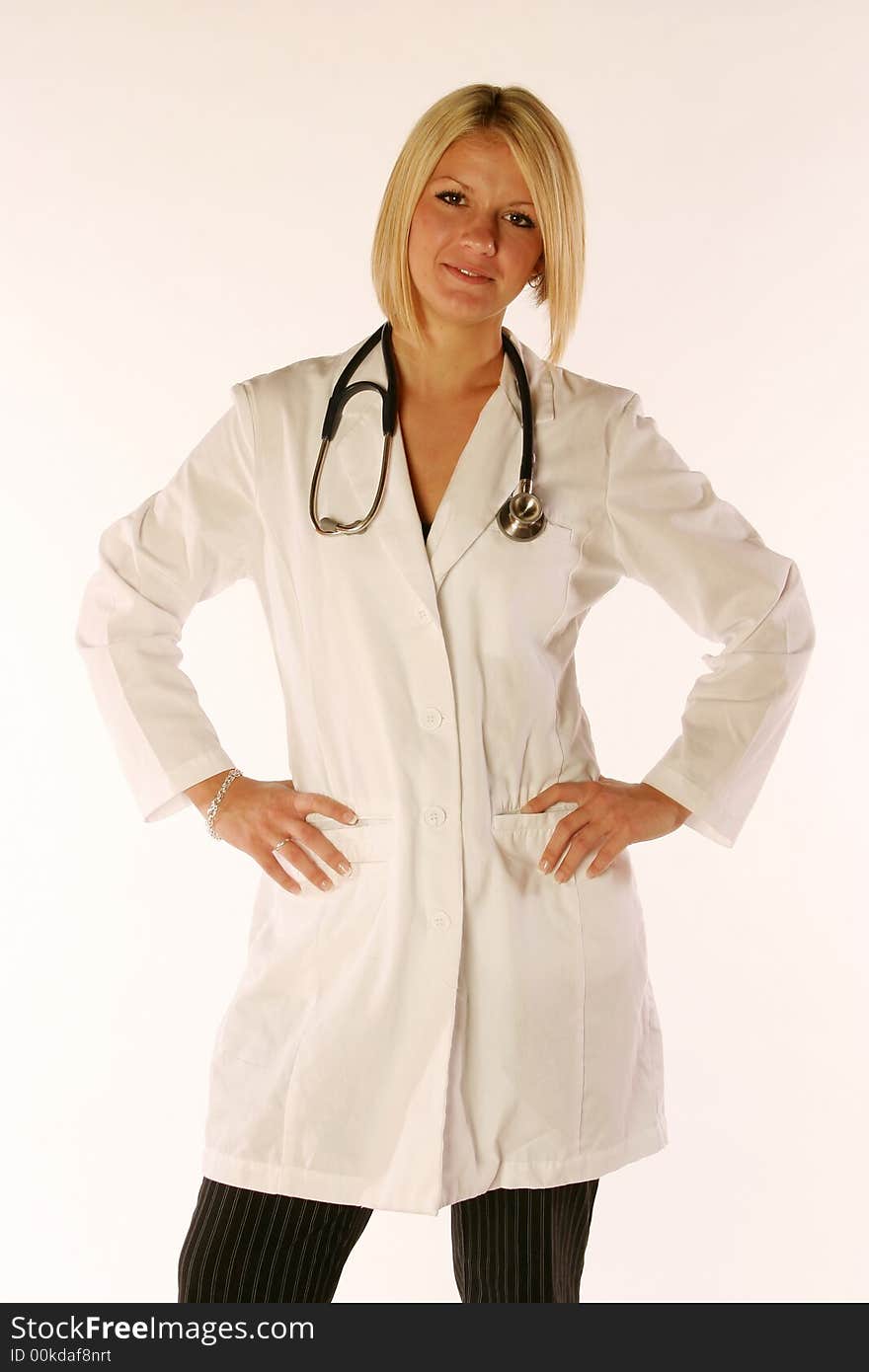 Female doctor holding an apple