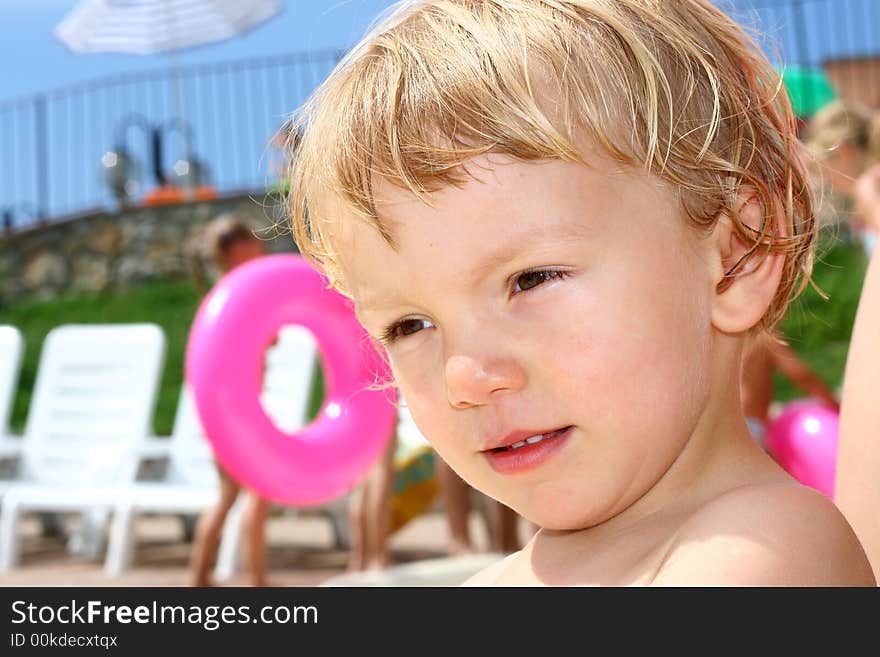 Cute boy in the pool