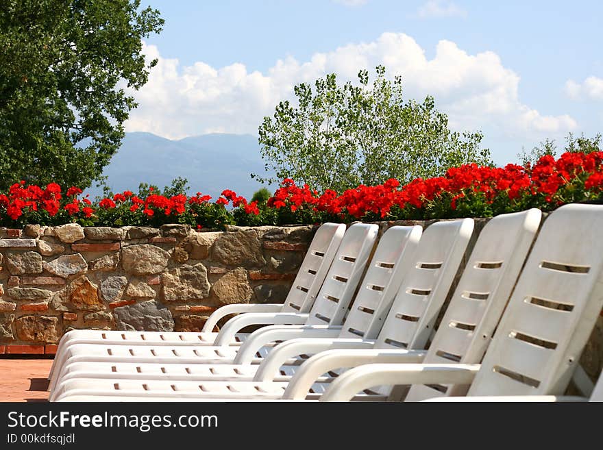 Empty Pool Chairs.