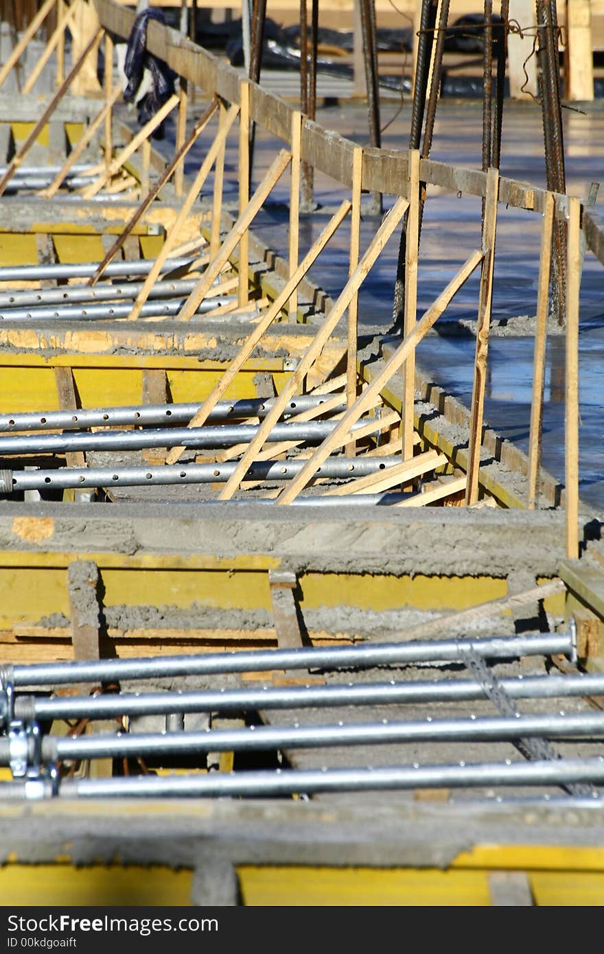 Close up at a part of construction site with some supports. Close up at a part of construction site with some supports