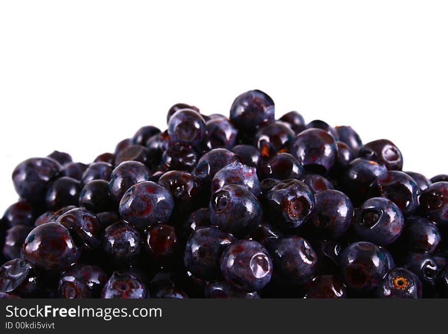 Blueberry close up isolated on white in glass. Blueberry close up isolated on white in glass