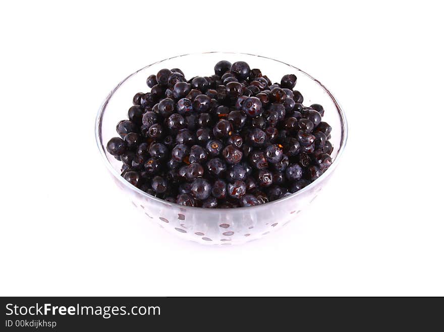 Blueberry close up isolated on white in glass. Blueberry close up isolated on white in glass