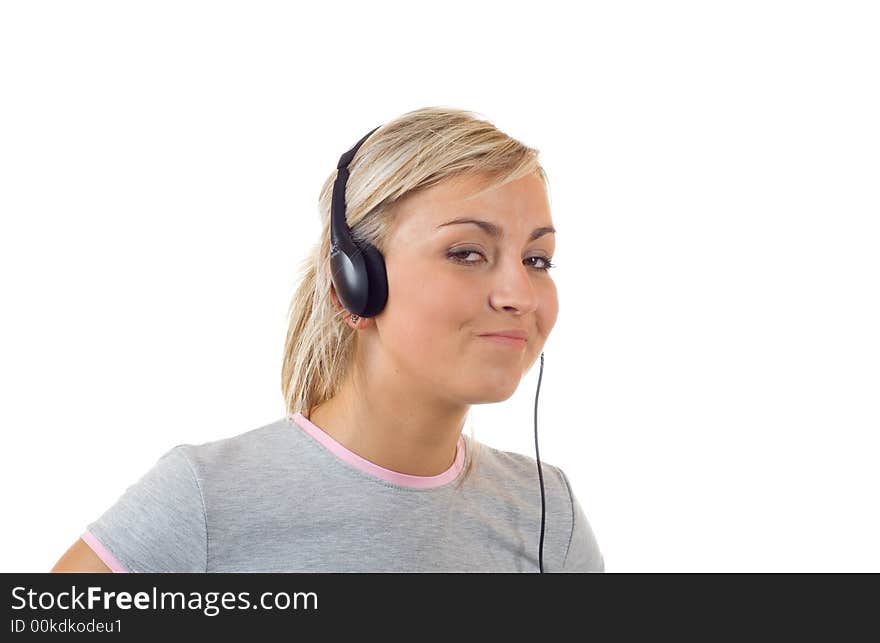 Young girl working with head phones. Young girl working with head phones