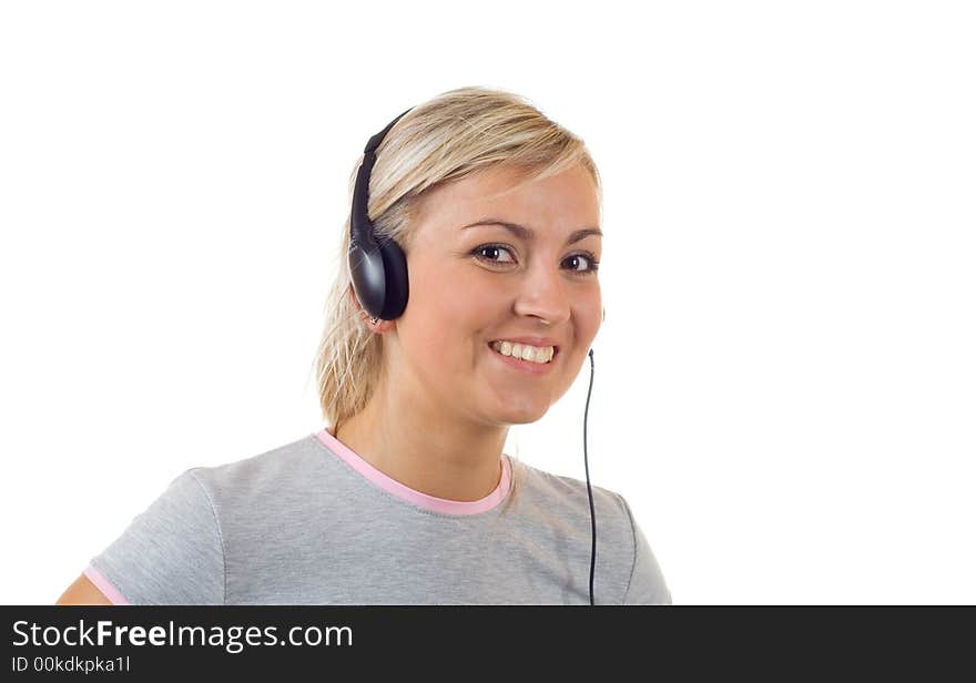 Young girl working with head phones. Young girl working with head phones