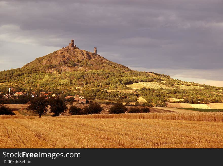 Ruin of gothic castle on peak