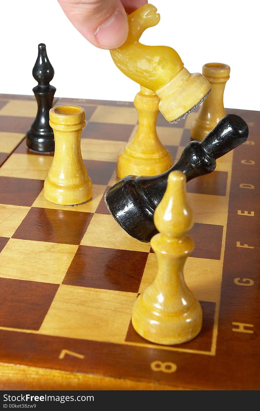 Game on a chessboard. Falling of a chess figure. Game on a chessboard. Falling of a chess figure.