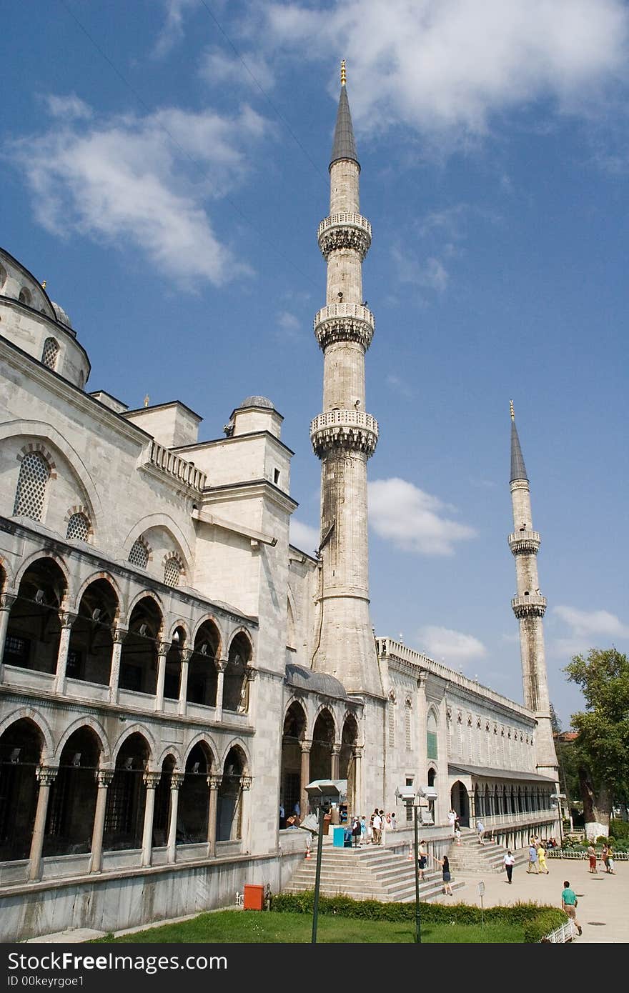 Kind on a minaret in a mosque of the city of Istanbul. Kind on a minaret in a mosque of the city of Istanbul