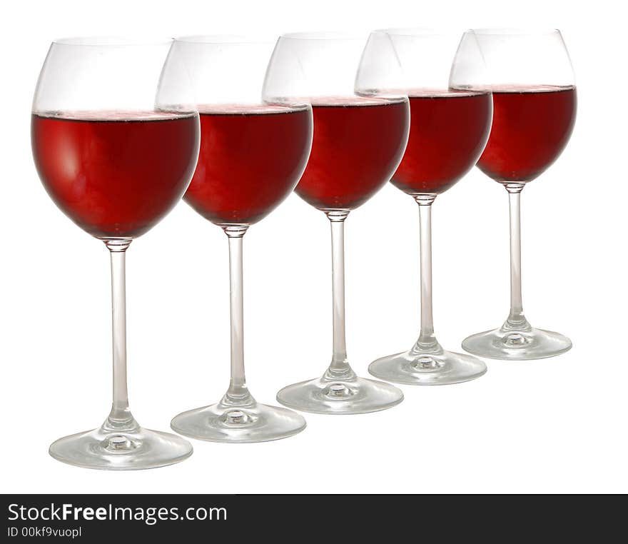 Five glasses of red wine isolated on white background