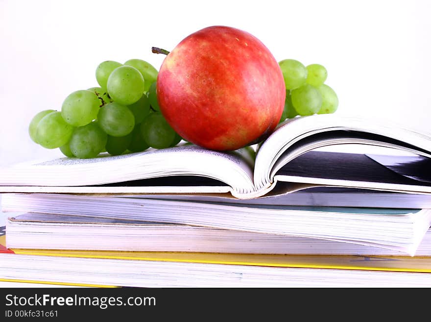 Books and apple