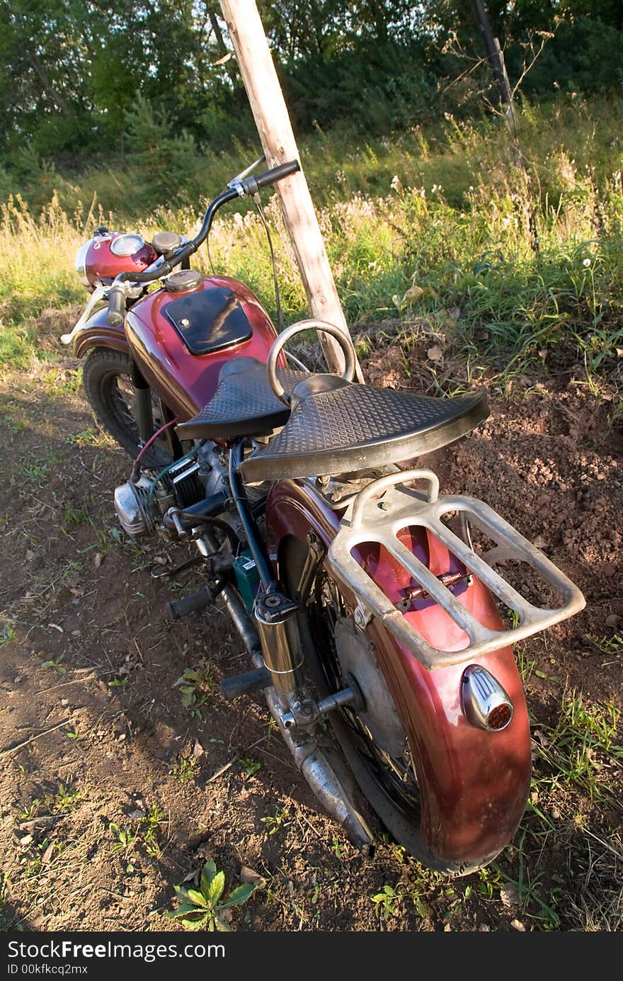 Dark-red russian renewed retro motorcycle