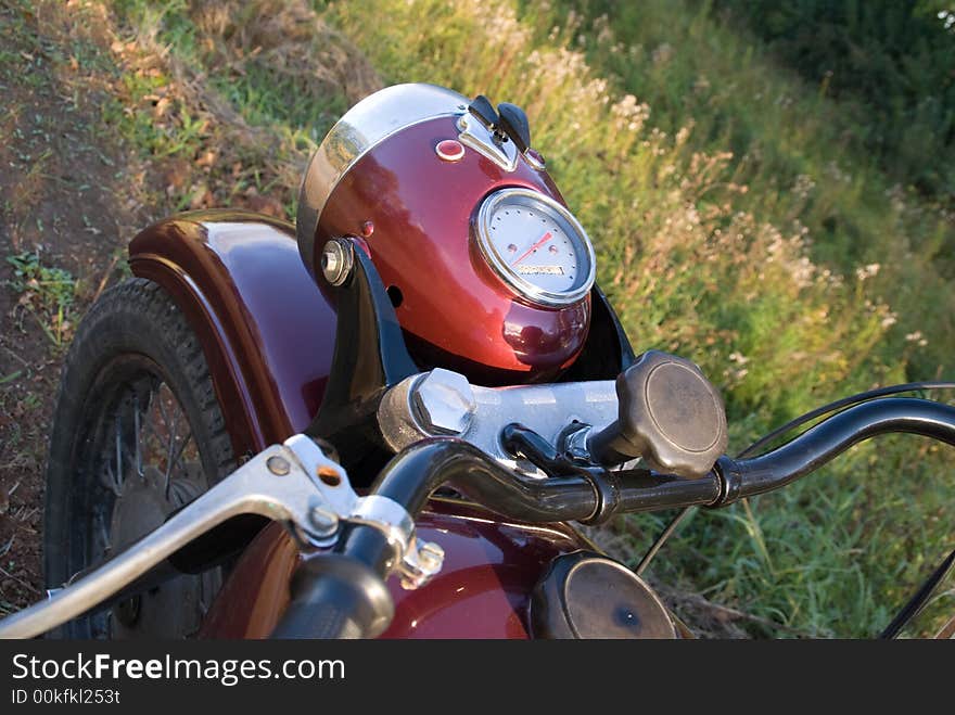 Dark-red russian renewed retro motorcycle