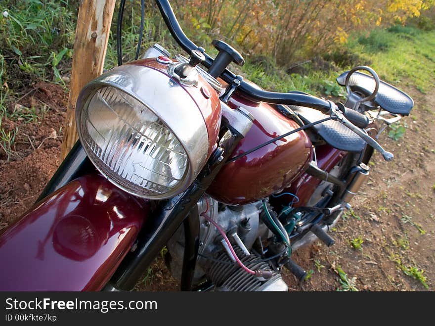 Dark-red russian renewed retro motorcycle