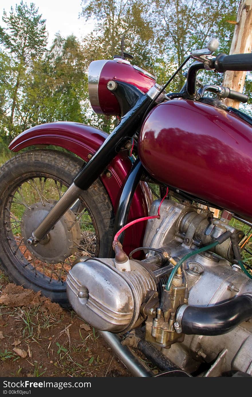 Dark-red russian renewed retro motorcycle